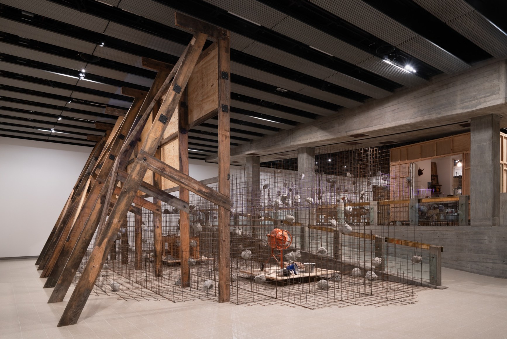 Installation view of Mike Nelson, Studio Apparatus for Kunsthalle Münster - A Thematic Instalment Observing the Calendrical Celebration of its Inception: Introduction; towards a linear understanding of notoriety, power, and their interconnectedness; futurobjecs (misspelt);mysterious island* *see introduction or Barothic shift, 2014. Various materials. Photo: Matt Greenwood., Courtesy the artist and the Hayward Gallery.