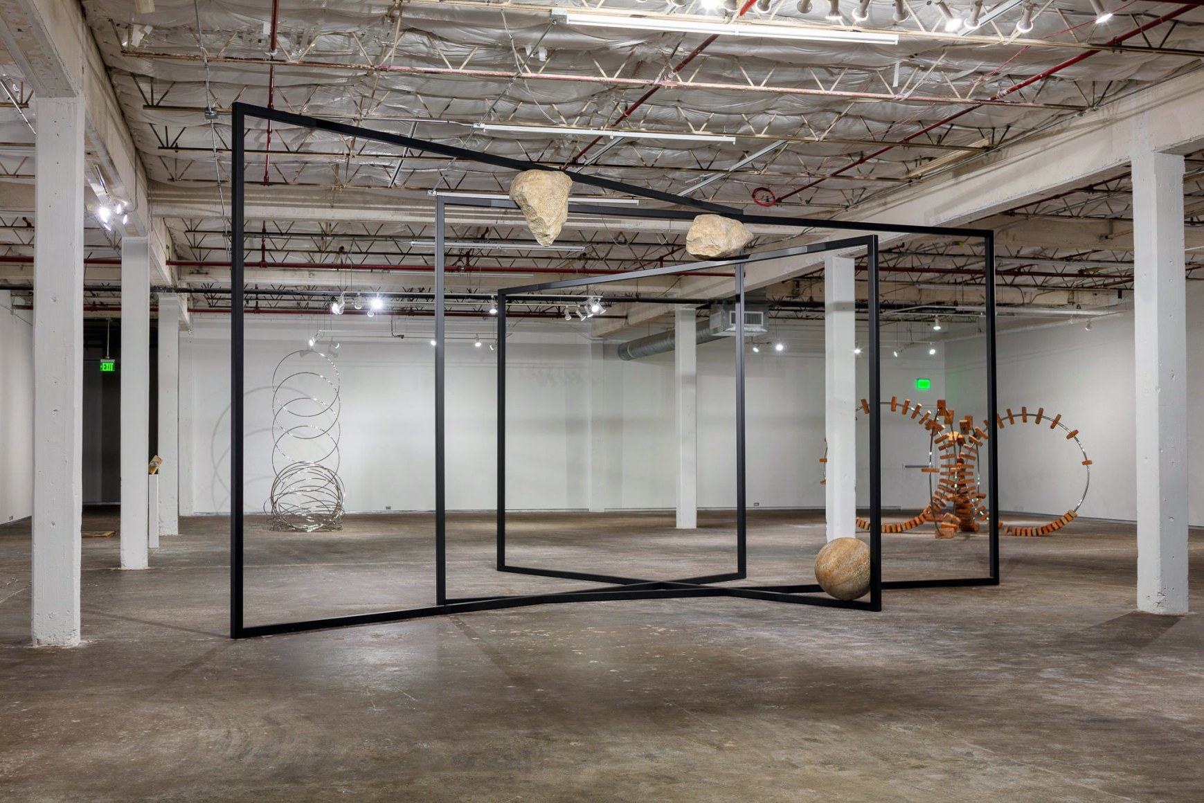 Installation view: Alicja Kwade, Moving in Glances, Dallas Contemporary, TX, Photo: Todora Photography LLC