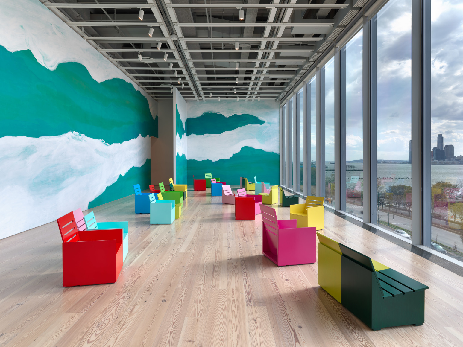 Installation view of&nbsp;Mary Heilmann: Long Line&nbsp;(Whitney Museum of American Art, New York, April 9, 2025-January 19, 2026). On wall:&nbsp;Long Line, 2025. On floor:&nbsp;Monochrome Chairs, 2015;&nbsp;April Chairs, 2025. Photograph by Ron Amstutz