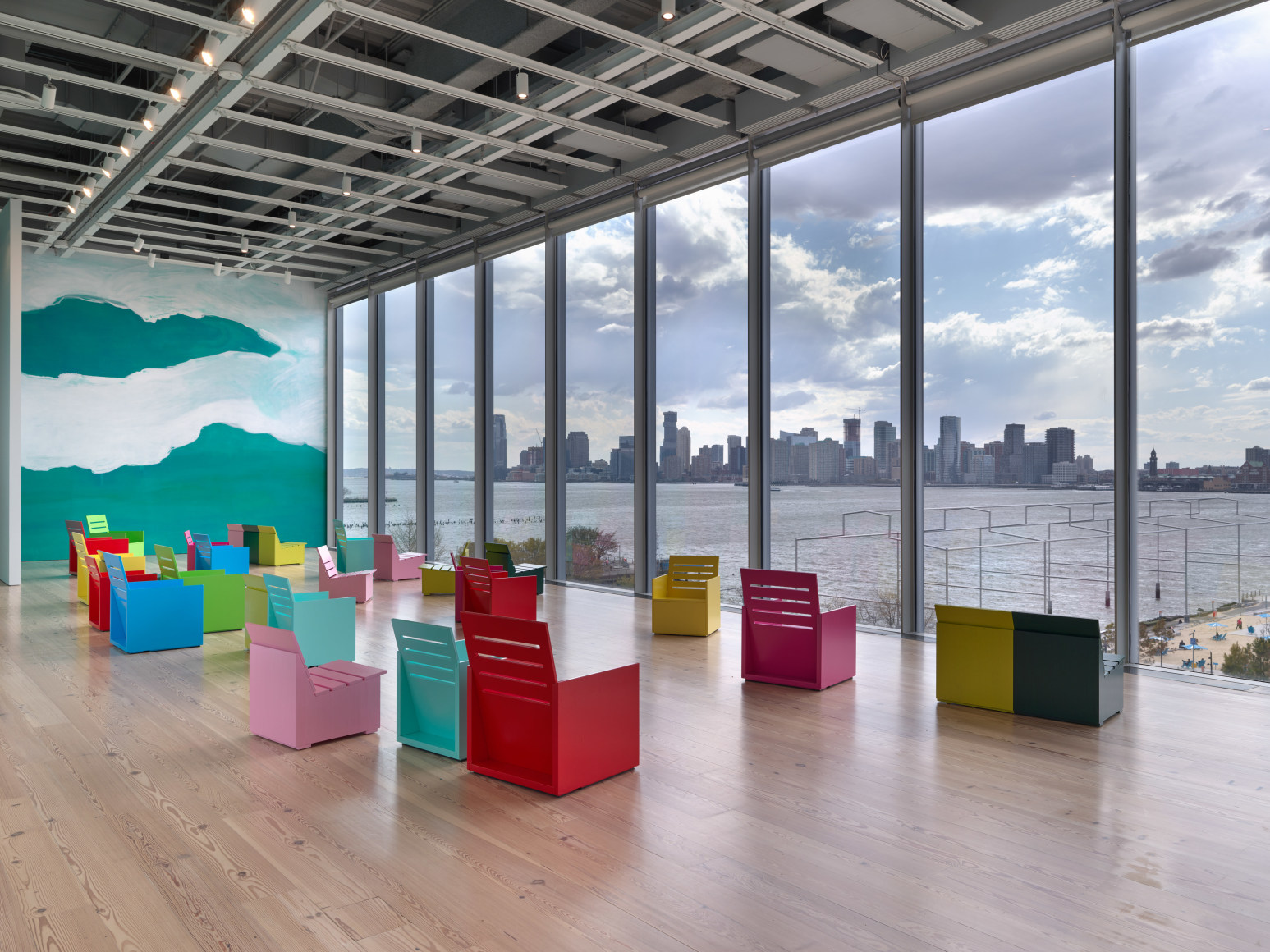 Installation view of&nbsp;Mary Heilmann: Long Line&nbsp;(Whitney Museum of American Art, New York, April 9, 2025-January 19, 2026). On wall:&nbsp;Long Line, 2025. On floor:&nbsp;Monochrome Chairs, 2015;&nbsp;April Chairs, 2025. Photograph by Ron Amstutz
