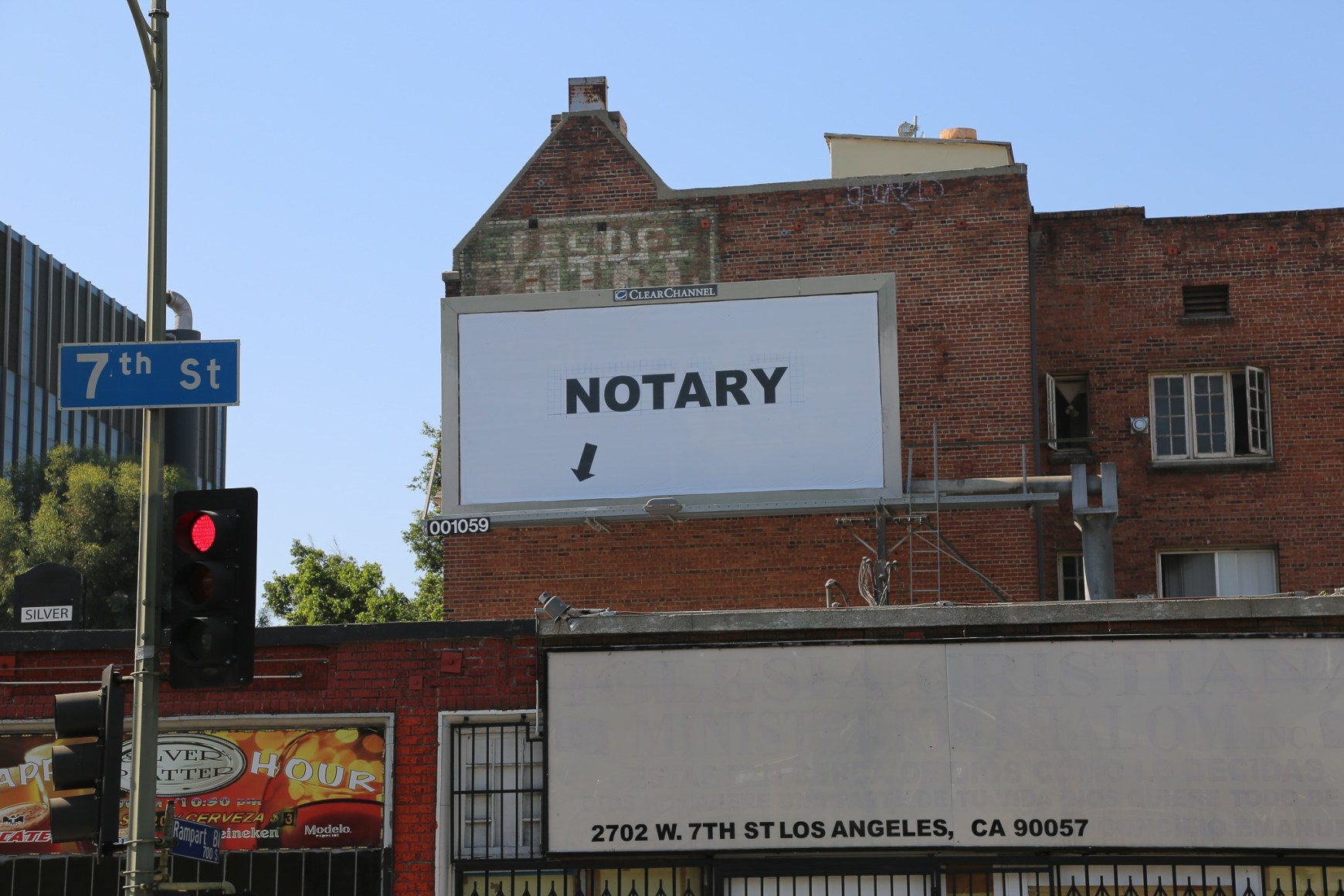 Larry Johnson, Notary, 2020. Billboard at S. Rampart Blvd. and W. Seventh St., Los Angeles 90057 (facing north). 144 × 288 in. (365.8 × 731.5 cm). Courtesy of the artist, David Kordansky Gallery, Los Angeles, and 303 Gallery, New York. Installation view, co-produced by The Billboard Creative for Made in L.A. 2020: a version. Photo: Joshua White / JWPictures.com