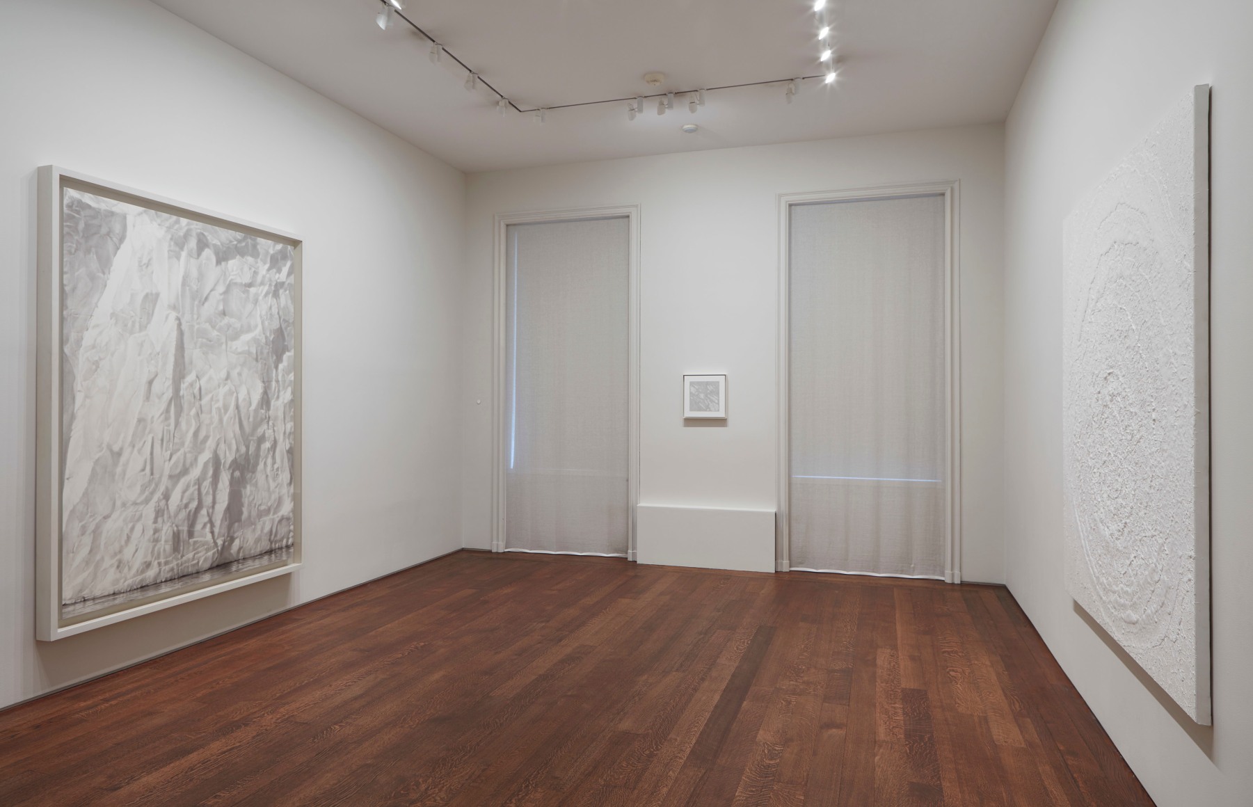 Installation view of White | Black: Works by Miquel Barcel&oacute;, Louise Bourgeois, Jacob El Hanani, Keith Haring, Rashid Johnson, Robert Longo, Jean Paul Riopelle, Joaqu&iacute;n Torres-Garc&iacute;a, and Andy Warhol at Acquavella Galleries from August 13 - September 28, 2018.
