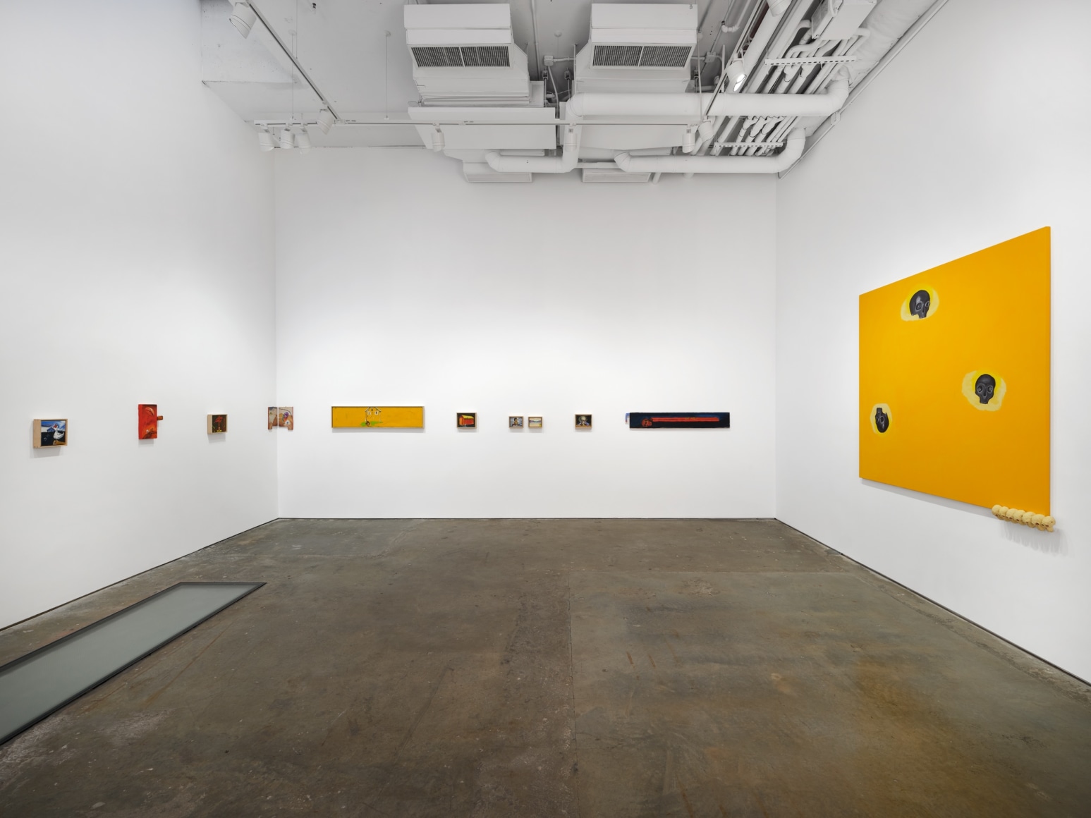 Gallery installation view featuring works by artist Enzo Cucchi
