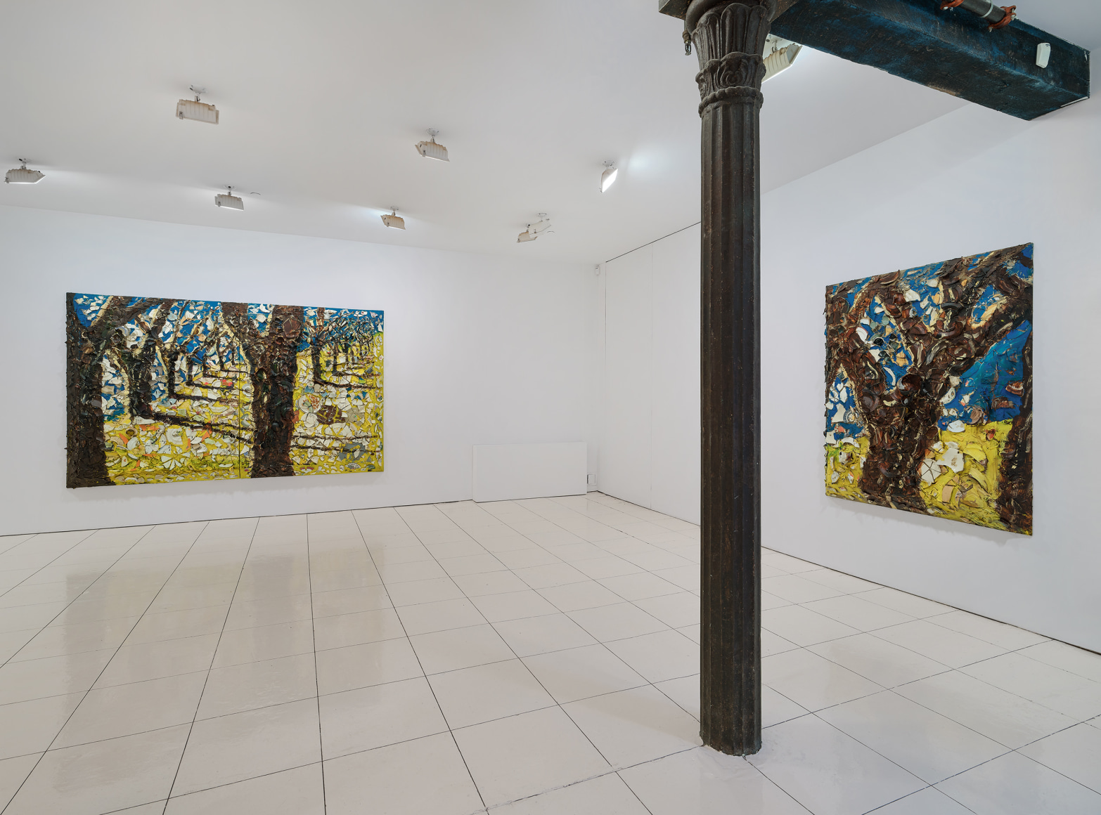 Installation view of Julian Schnabel plate paintings of trees