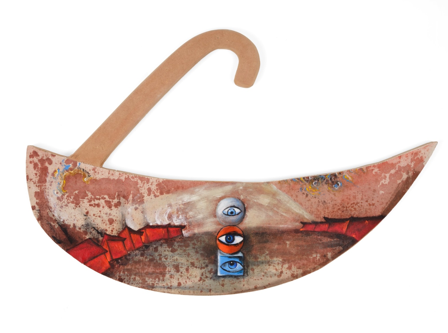 crescent-shaped canvas with painted eyes