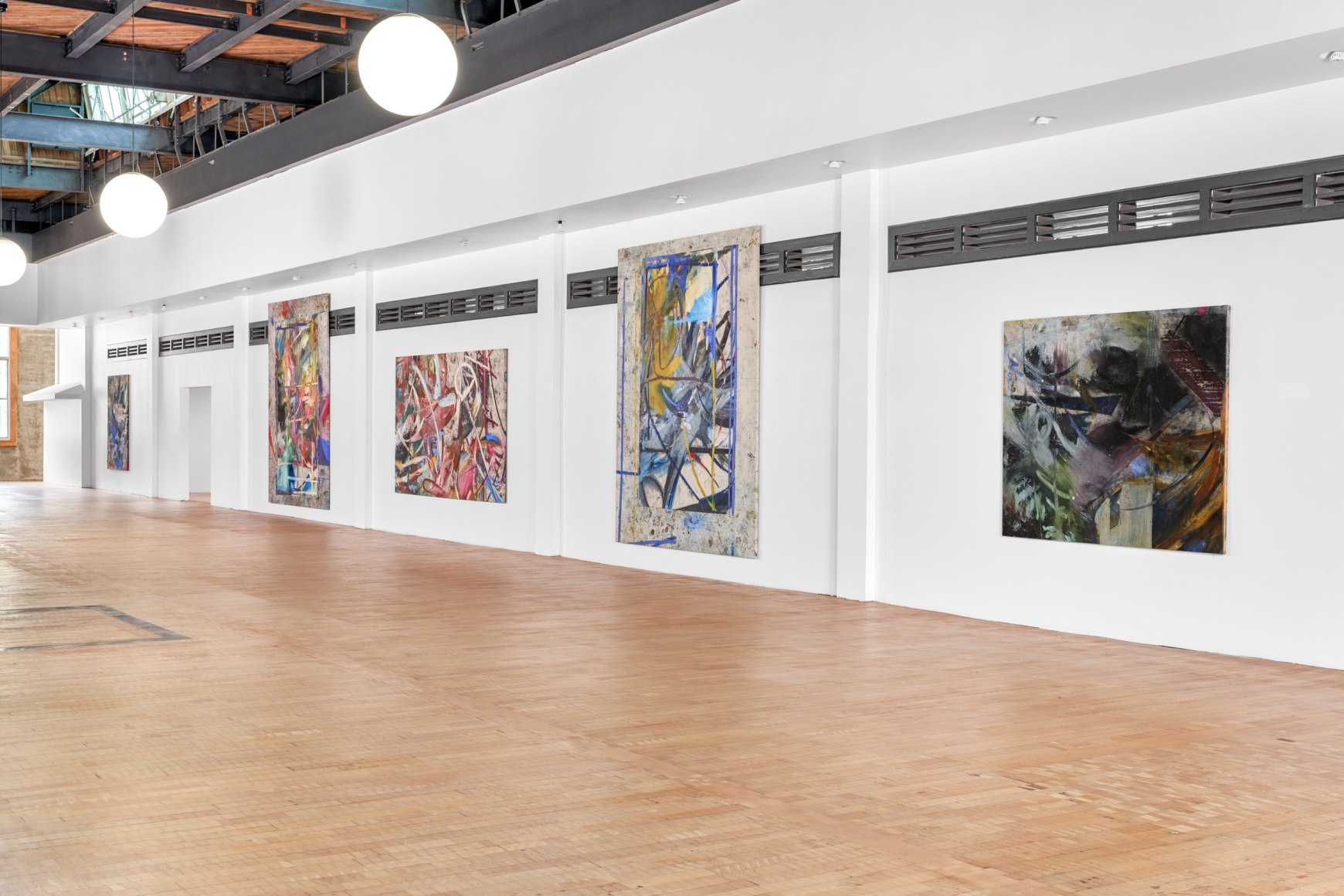 Installation view of Mariana Oushiro Paintings in a post office