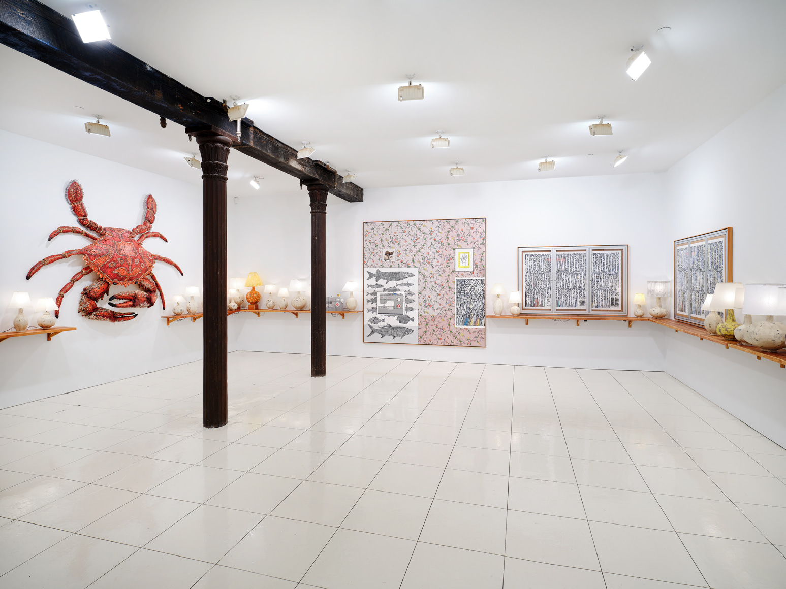 Installation view of Zachary Armstrong: New Work, featuring crab sculpture, lamps, paintings, and sewing machine sculptures by Zachary Armstrong