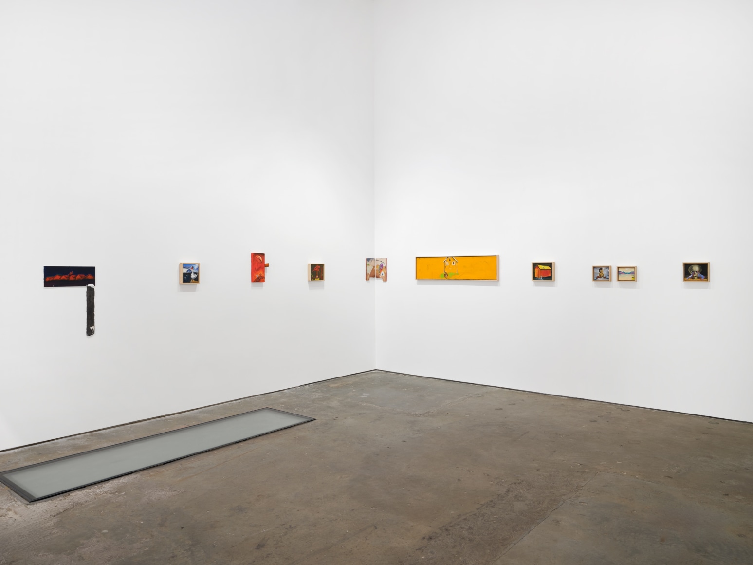 Gallery installation view featuring works by artist Enzo Cucchi