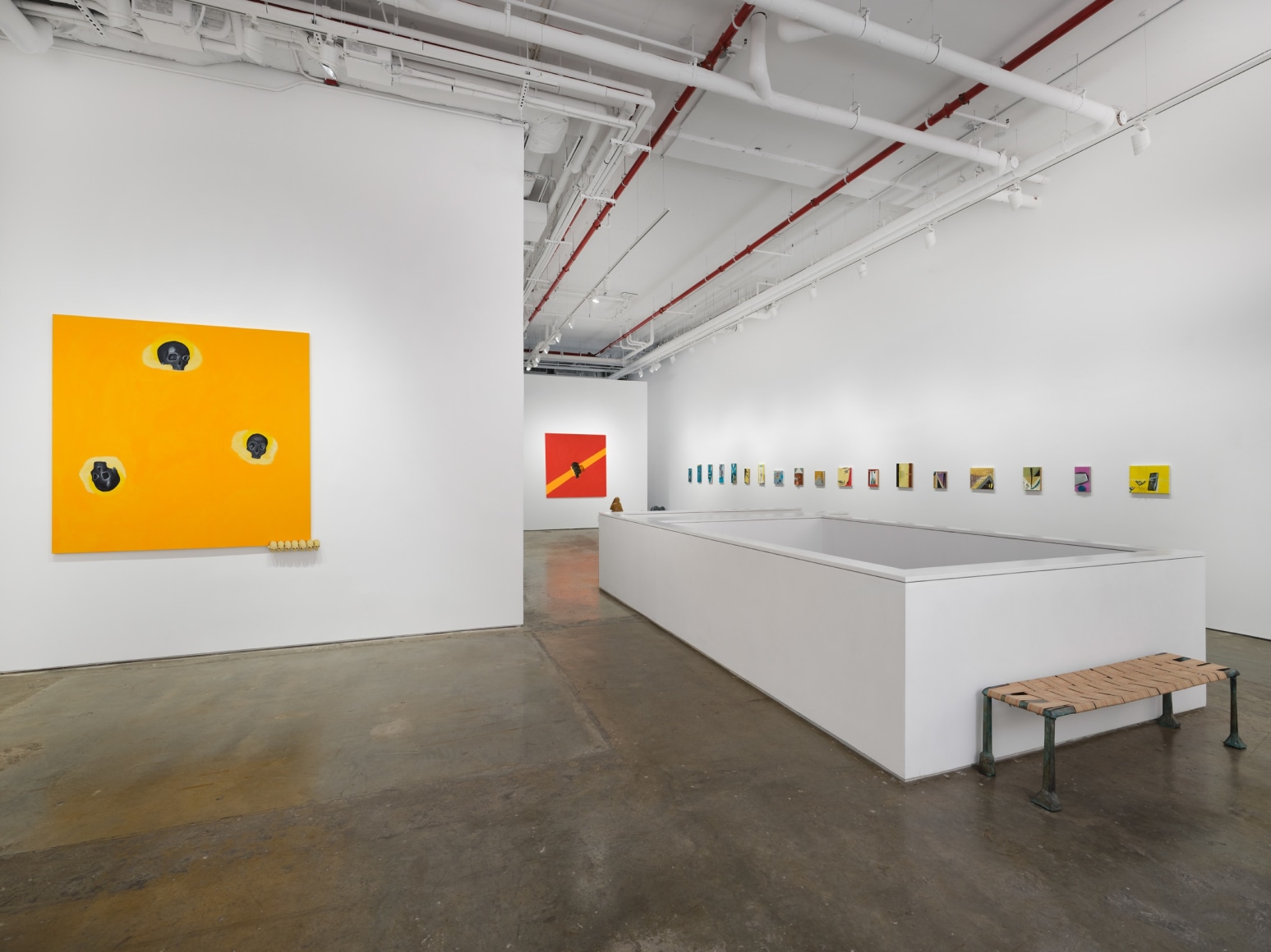Gallery installation view featuring works by artist Enzo Cucchi