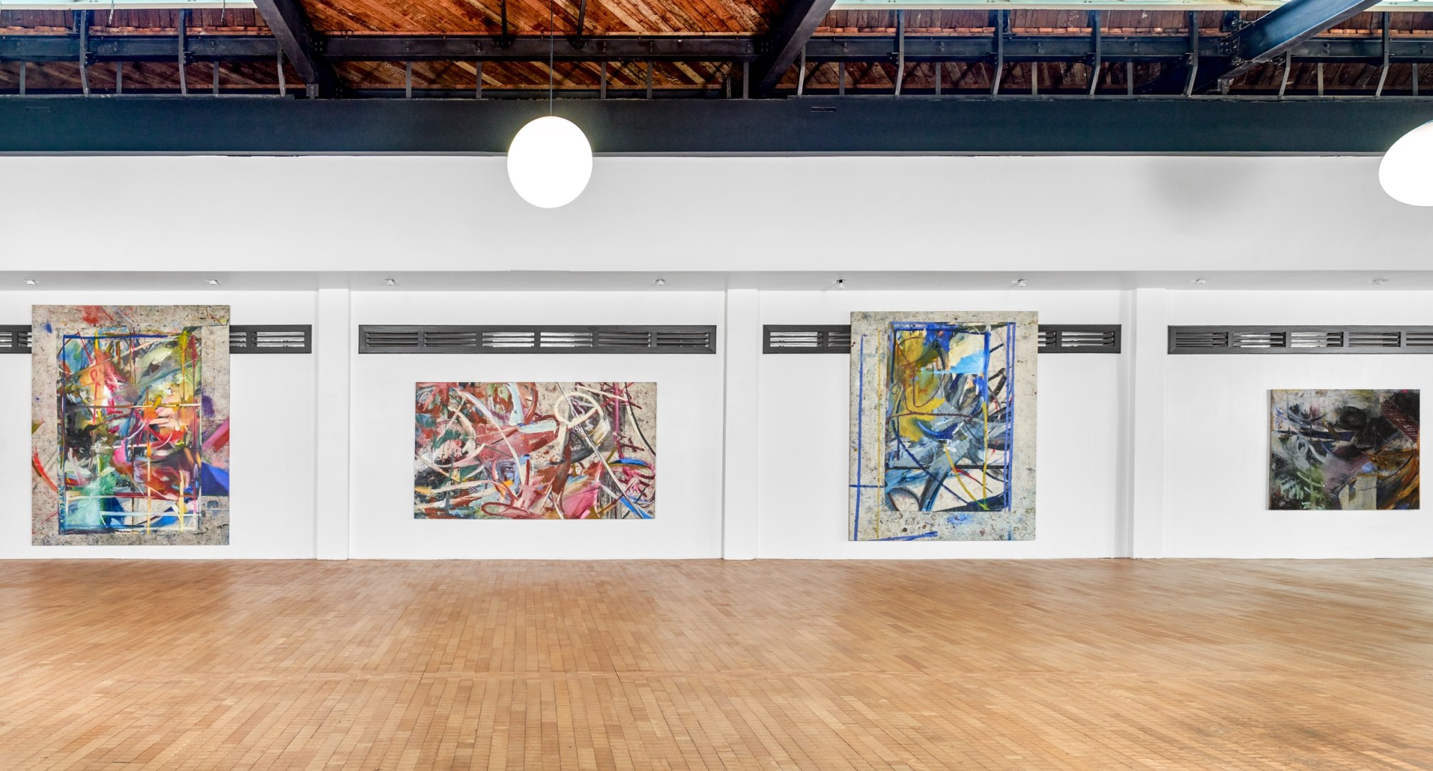Installation view of Mariana Oushiro Paintings in a post office