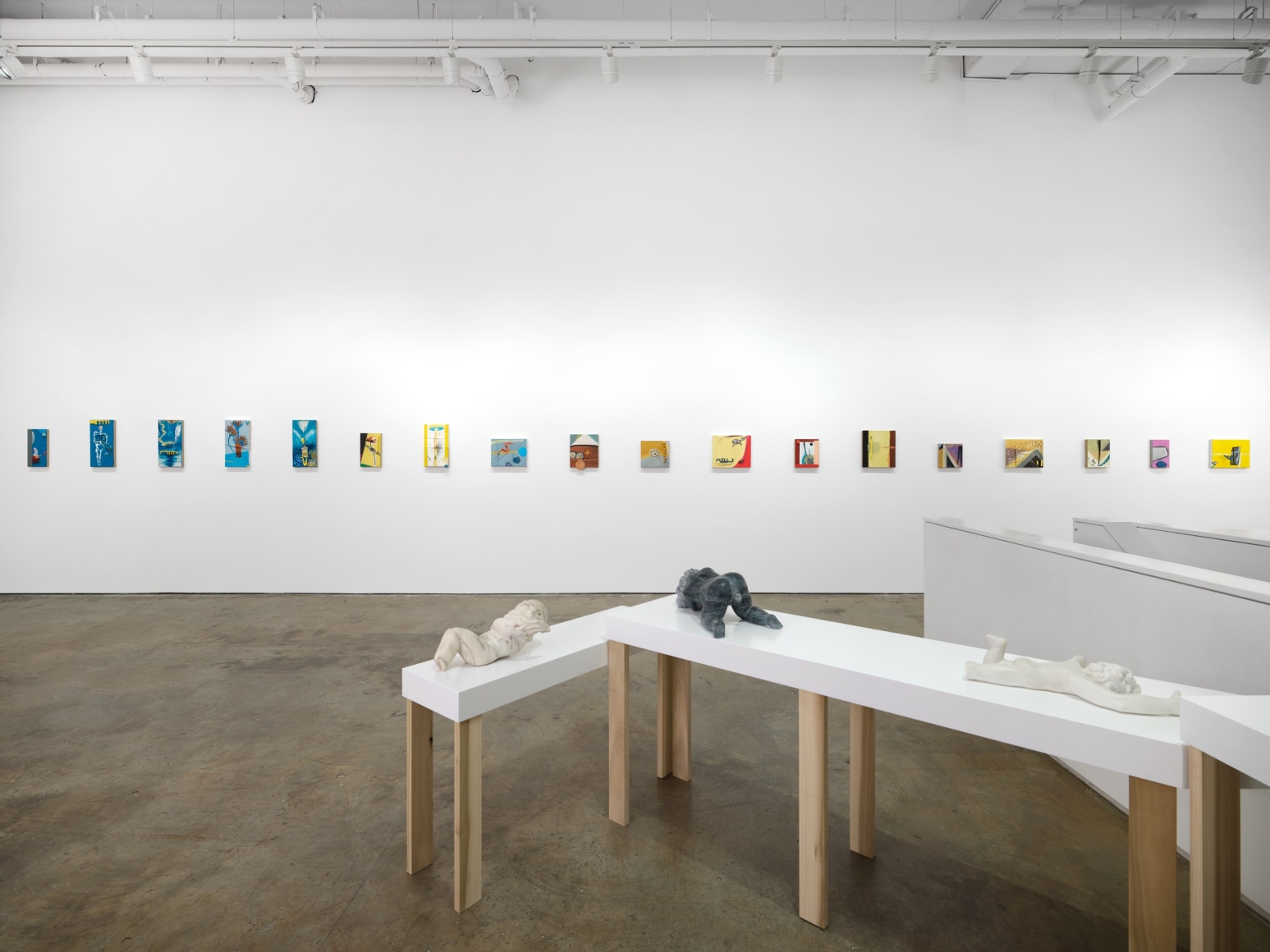 Gallery installation view featuring works by artist Enzo Cucchi