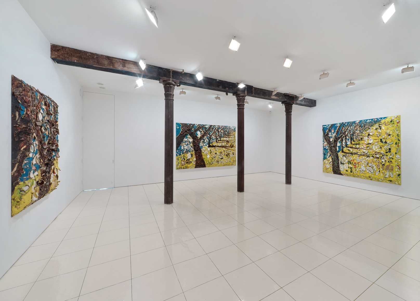 Installation view of Julian Schnabel plate paintings of trees