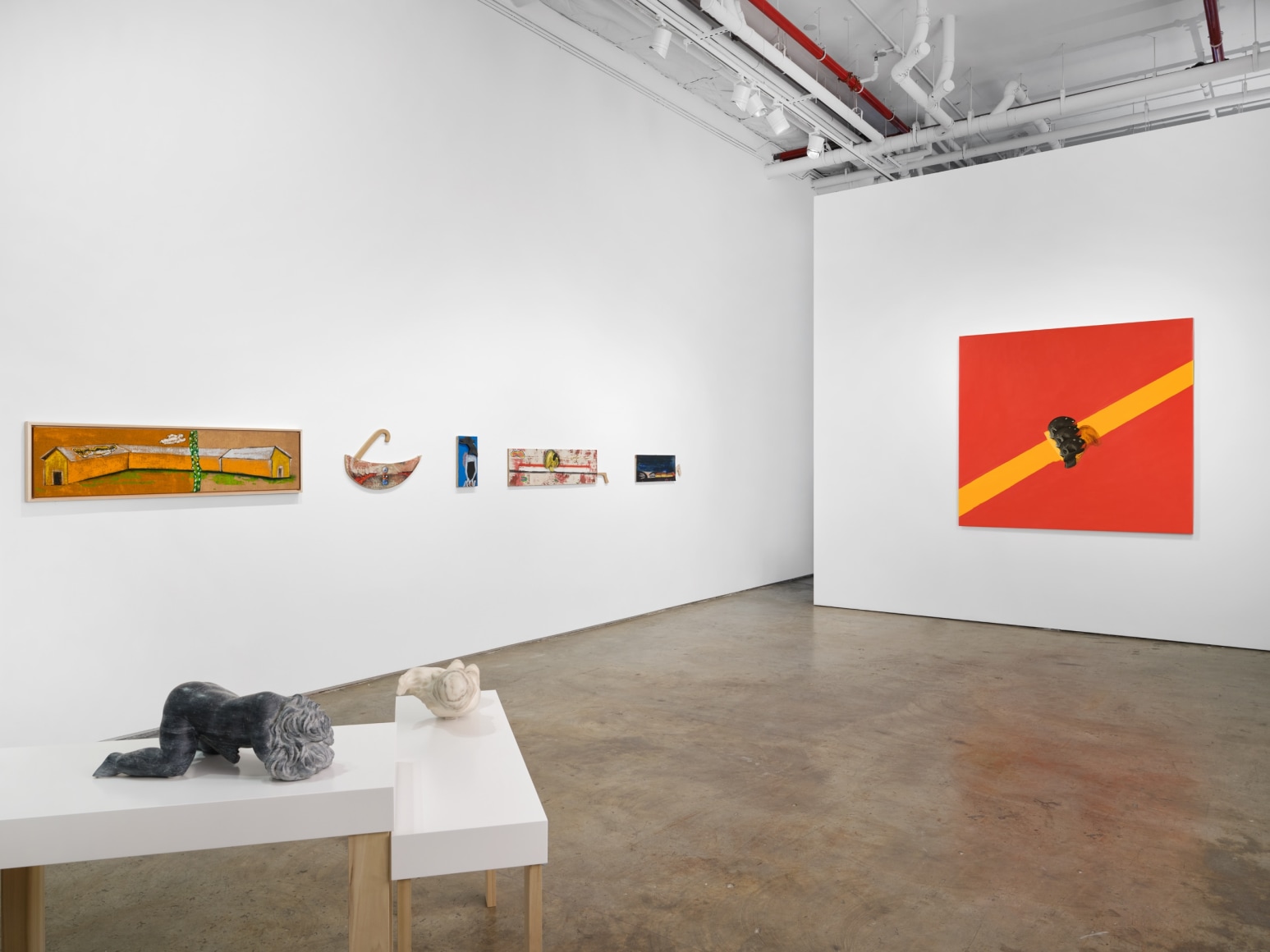 Gallery installation view featuring works by artist Enzo Cucchi