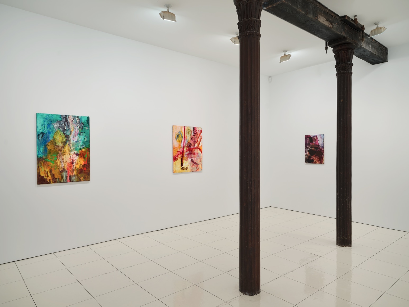 Installation view of Bill Jensen's Wandering Boundless and Free featuring colorful, abstract paintings