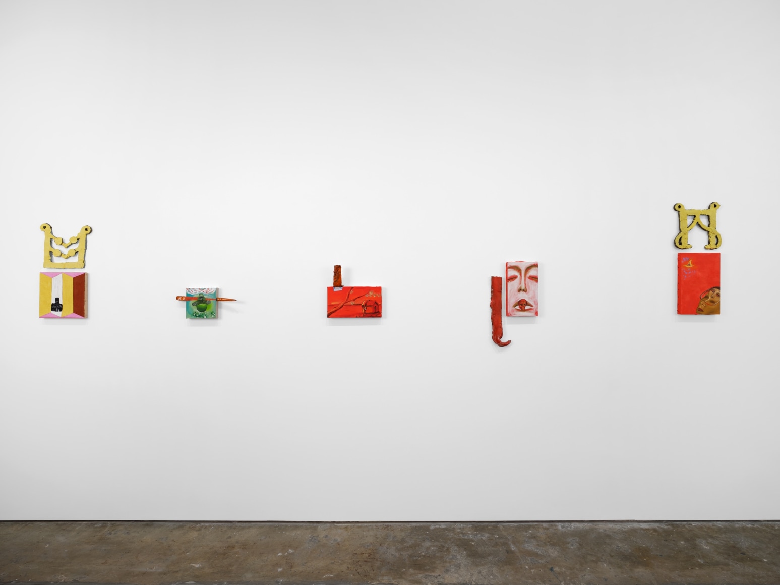 Gallery installation view featuring works by artist Enzo Cucchi