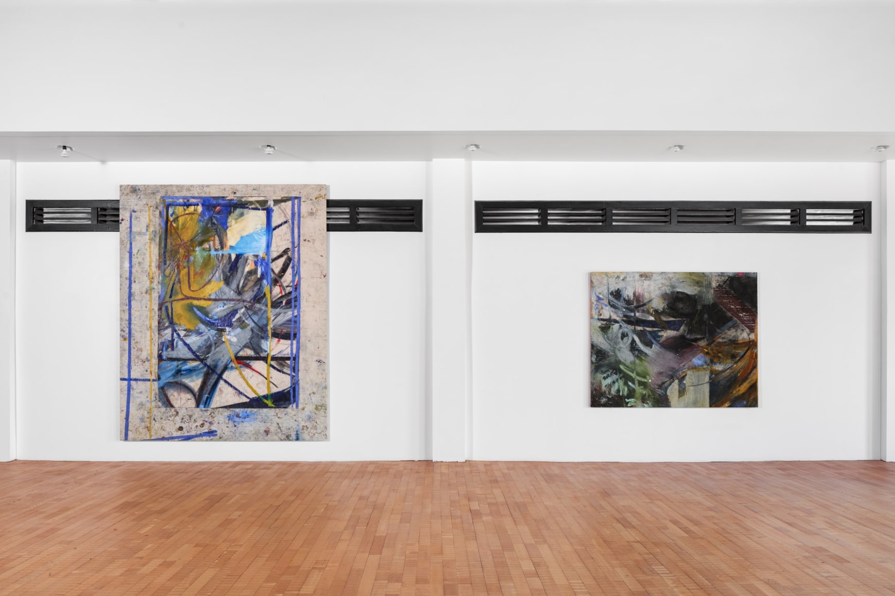 Installation view of Mariana Oushiro Paintings in a post office