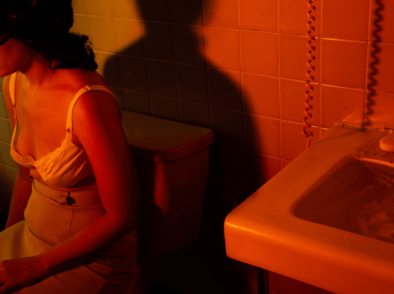 Tania Franco Klein, Sink Overflowing (Self-portrait), 2022, from the series Break in Case of Emergency. Archival pigment print.