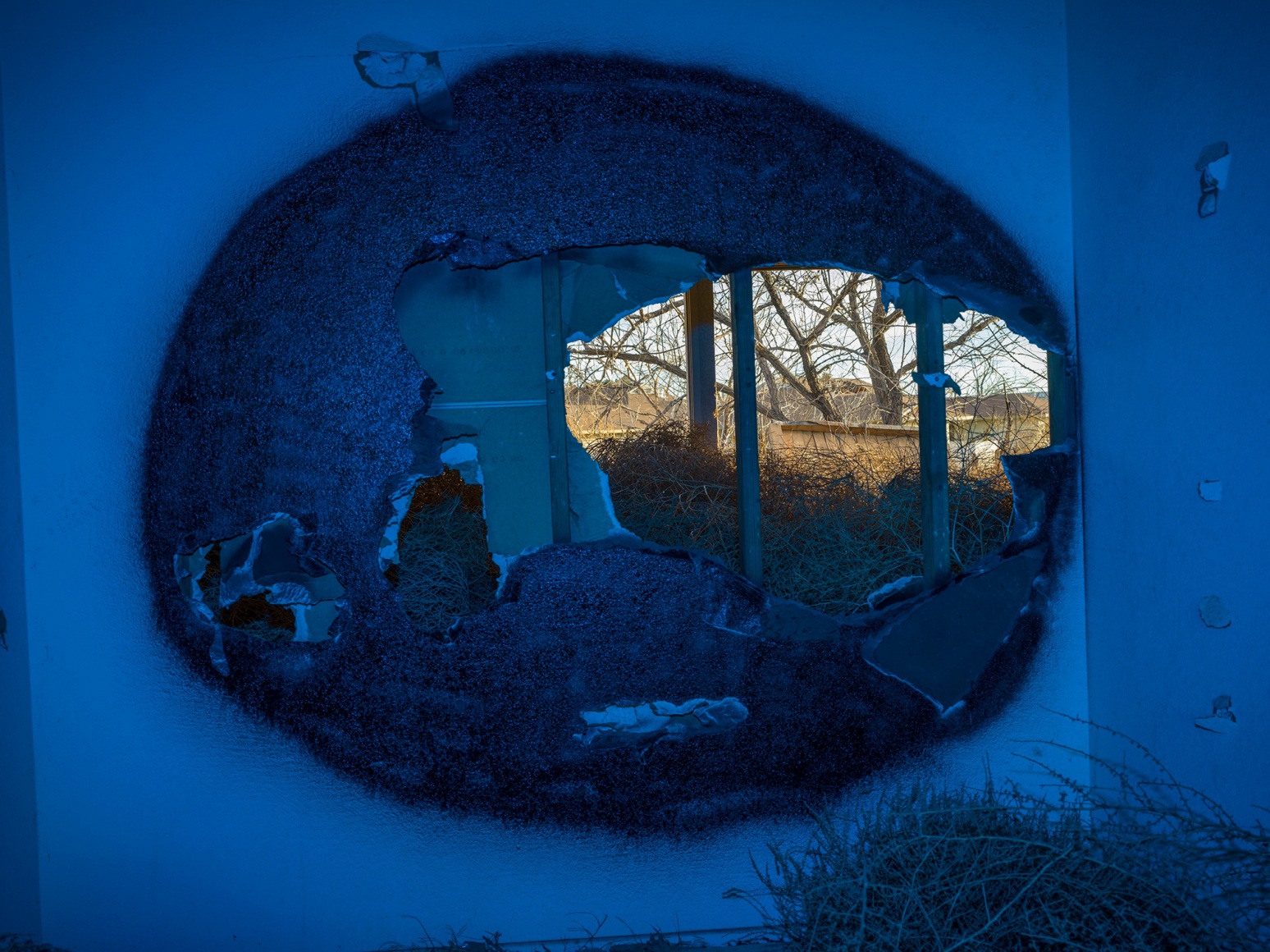 John Divola, GAFB B16576 (12_16_2020),&nbsp;2019&ndash;2024, from the series Blue with Exceptions. Archival pigment print, 36 1/2 x 48 3/4 inches.