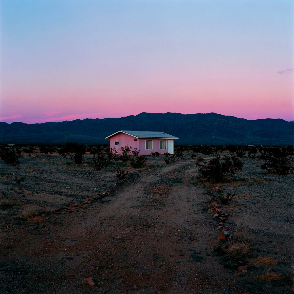 John Divola,&nbsp;N34&deg;11.965&#039; W115&deg;54.308&#039;, 1995-1998, from the series Isolated Houses.&nbsp;Archival pigment print, 30 x 30 inches.