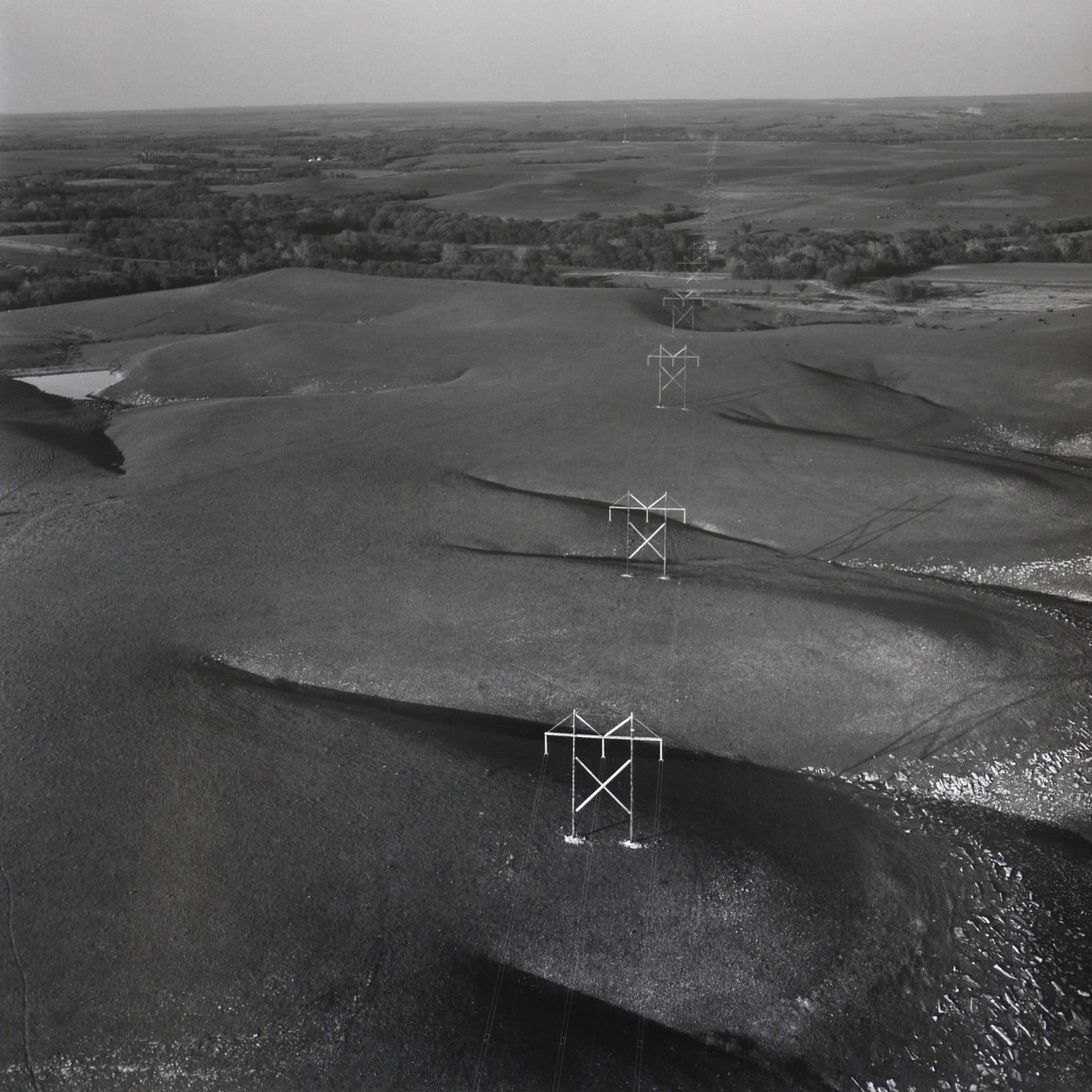 East of Matfield Green, Chase County, Kansas (Flint Hill Poles), 1990,&nbsp;15 x 15 inch gelatin silver print