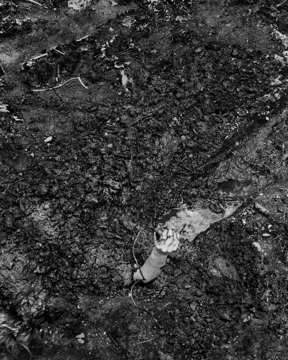 Jenny Calivas, Self-Portrait While Buried #2, 2021. Gelatin silver print, 50 x 40 inches.