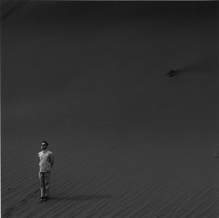 Tseng Kwong Chi,&nbsp;Oshima, Japan,&nbsp;1988. Gelatin silver print, 38 x 38 inches.