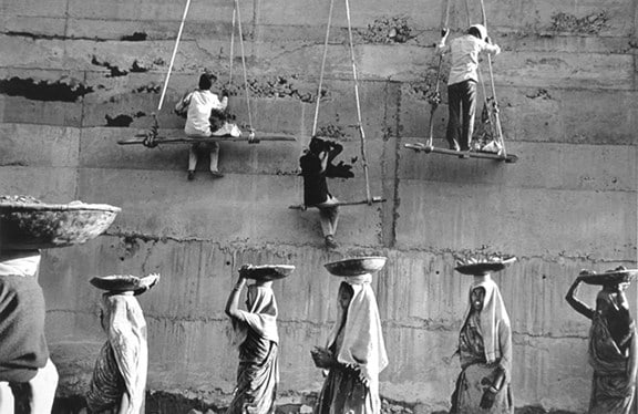 Women carrying mud and stones, Sandar, Sarovar Dam, Gujarat, India, from the series Workers, 1990. 16 x 20, 20 x 24, 24 x 35, 36 x 50 or 50 x 68 inch gelatin silver print
