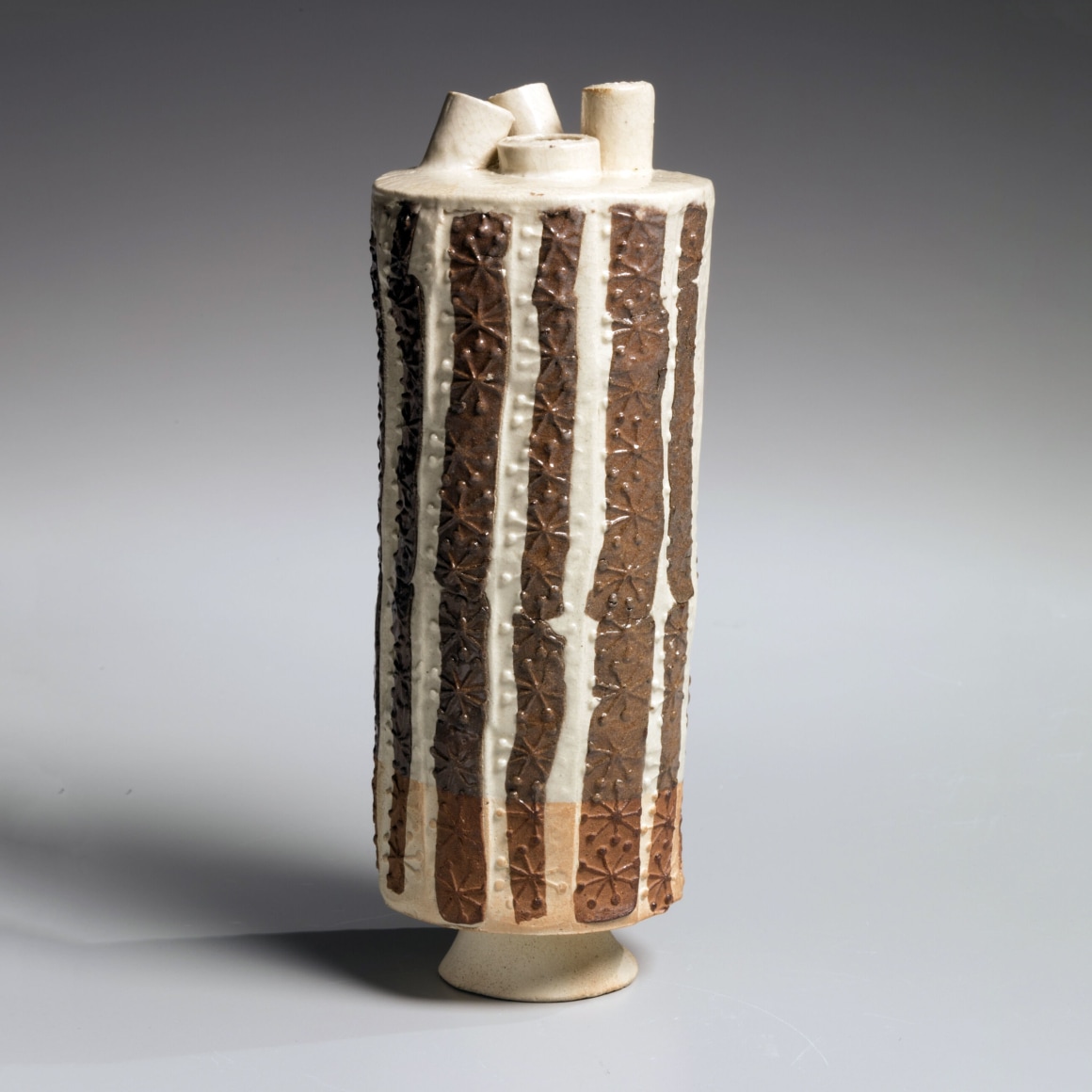 Yagi Kazuo (1918-1979), Tubular sculpture with stamped floral pattern