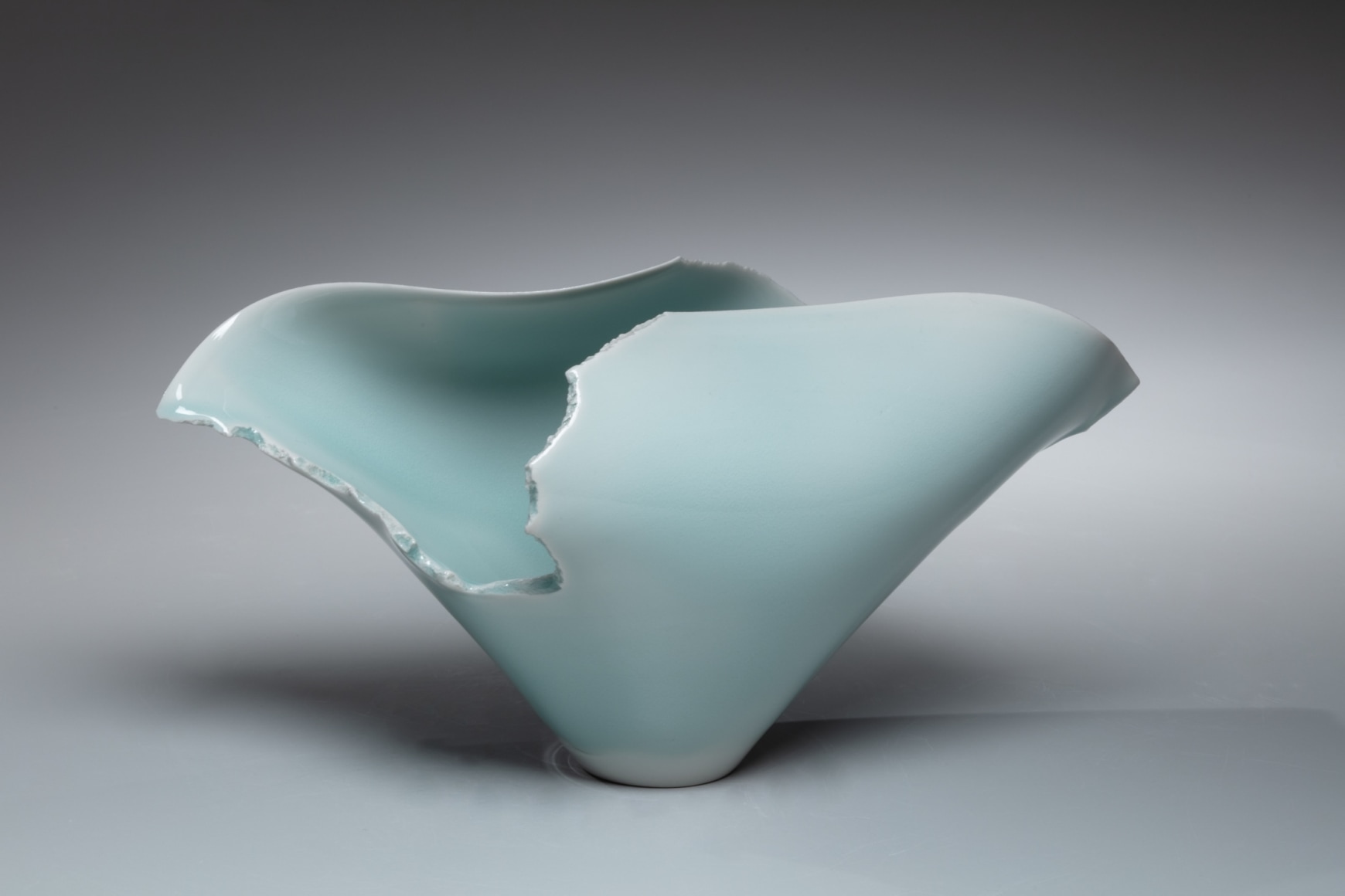 Ravine T21-14KE; Standing vessel-shaped from with curving, curling rim and large torn sides, 2021