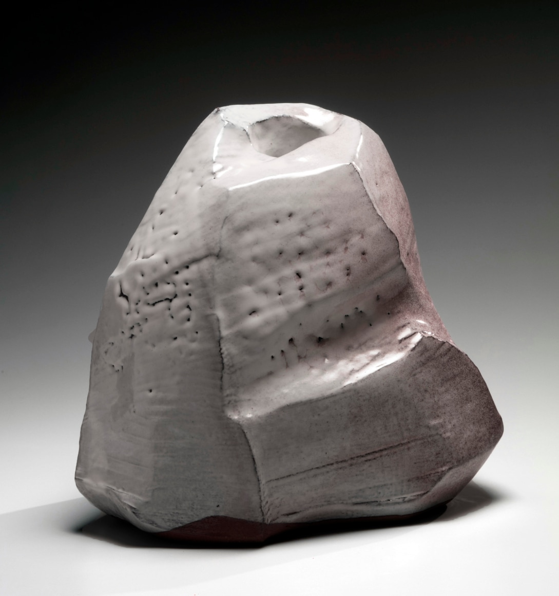 Kaneta Masanao (b. 1953), Rock-like, scooped-out standing vessel with multi-plane body, unctuous Hagi&nbsp;glaze and kiln effects