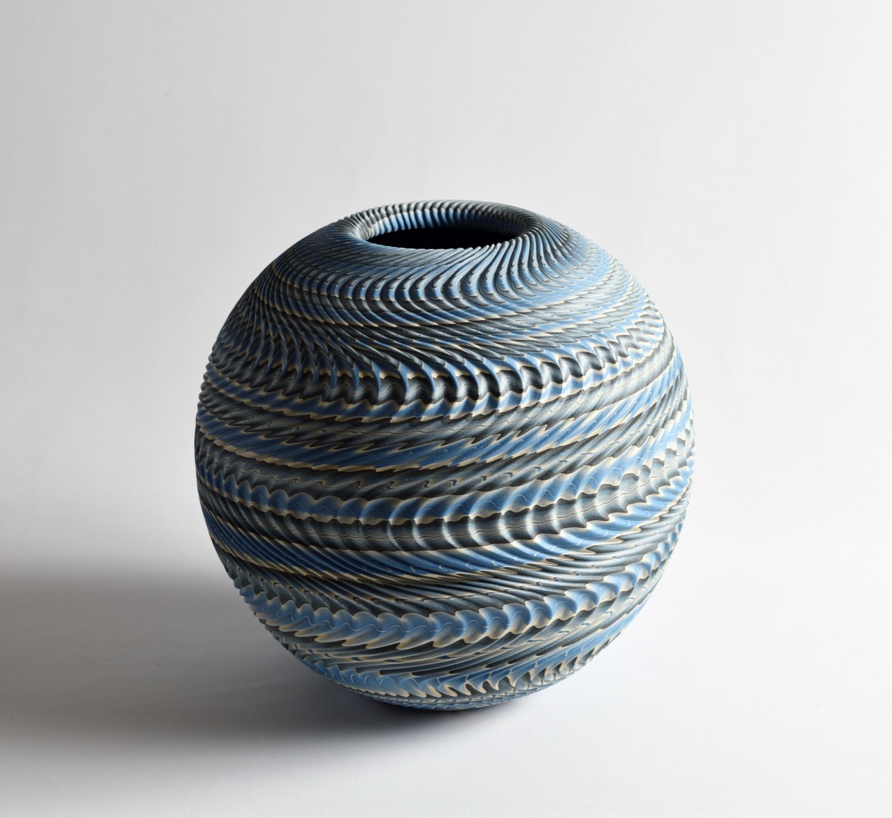 Ogata Kamio (b. 1949), Neriage&nbsp;(marbleized) vessel with carved, ridged surface and recessed mouth titled &ldquo;Rinpa&rdquo;