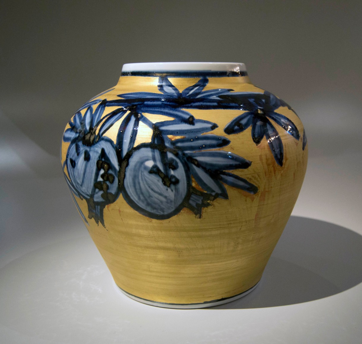 Gold overglazed porcelain vase with pomegranate design, ca. 1978
