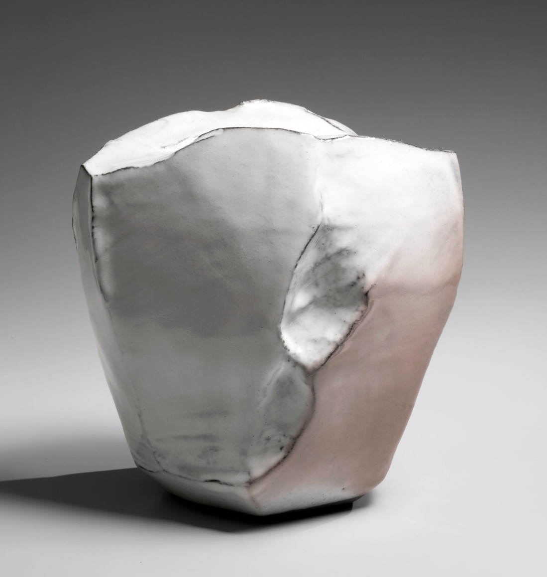 Kaneta Masanao (b. 1953), Rock-like vase with multi-plane body, Hagi glaze and kiln effects