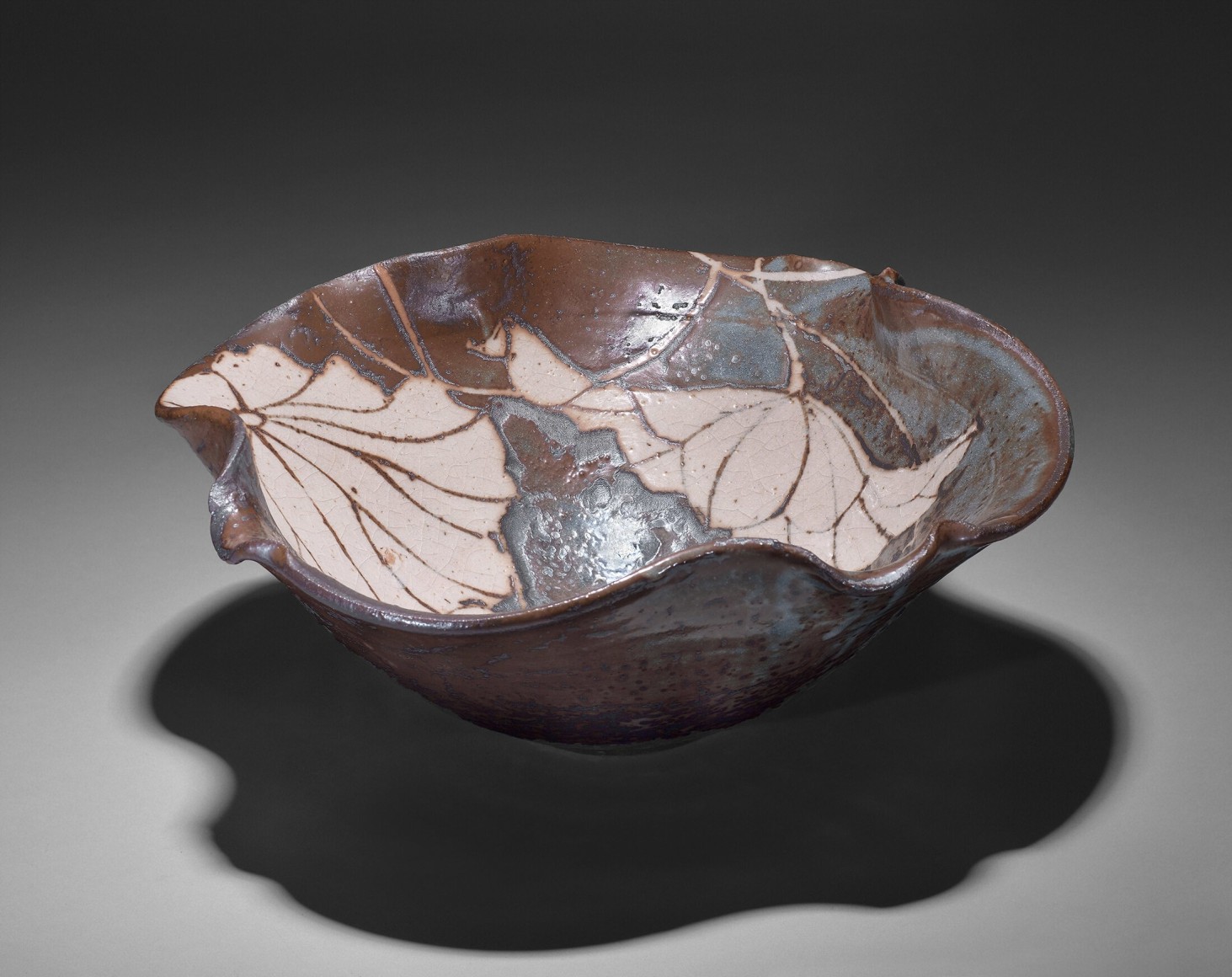 Undulating nezumi-shino type lotus-leaf-shaped bowl with lotus leaf resist-patterning