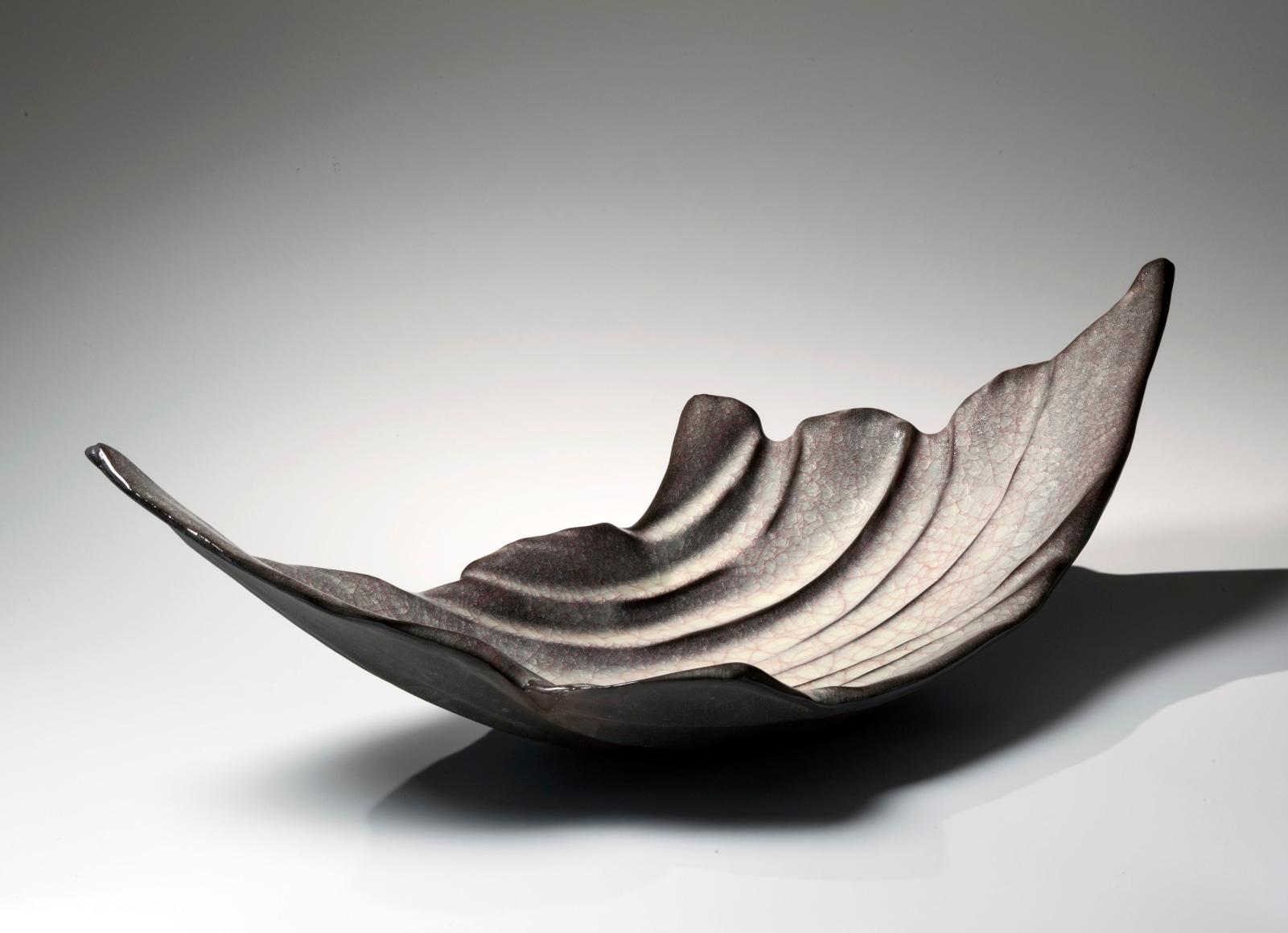 Craquelure rice-colored, crystallized, celadon-glazed wave-inspired platter&nbsp;, 2014