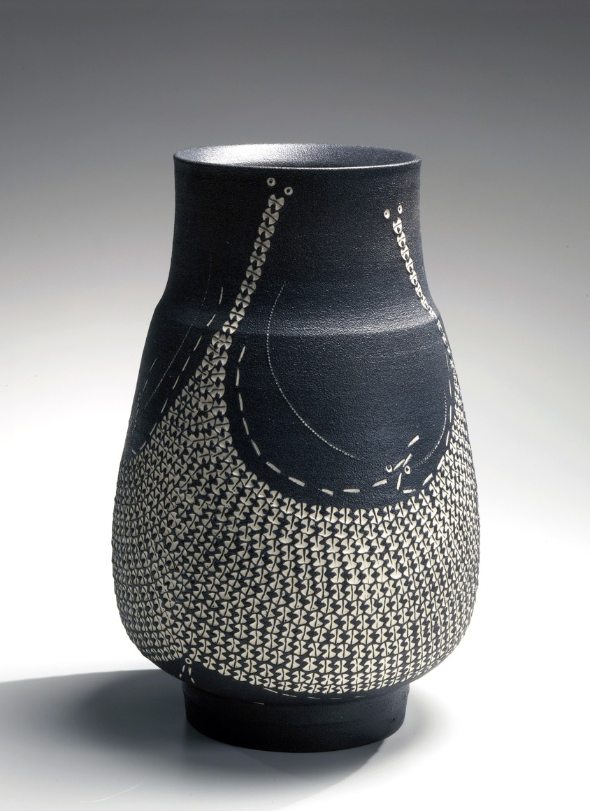 Kondo Yutaka (1932-1983), White slip-inlaid stoneware vase with textured black glaze and impressed rouletted patterning