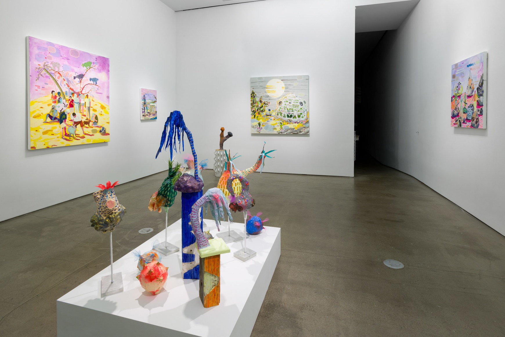 Installation view of Melanie Daniel's solo exhibition, featuring paintings and sculptures