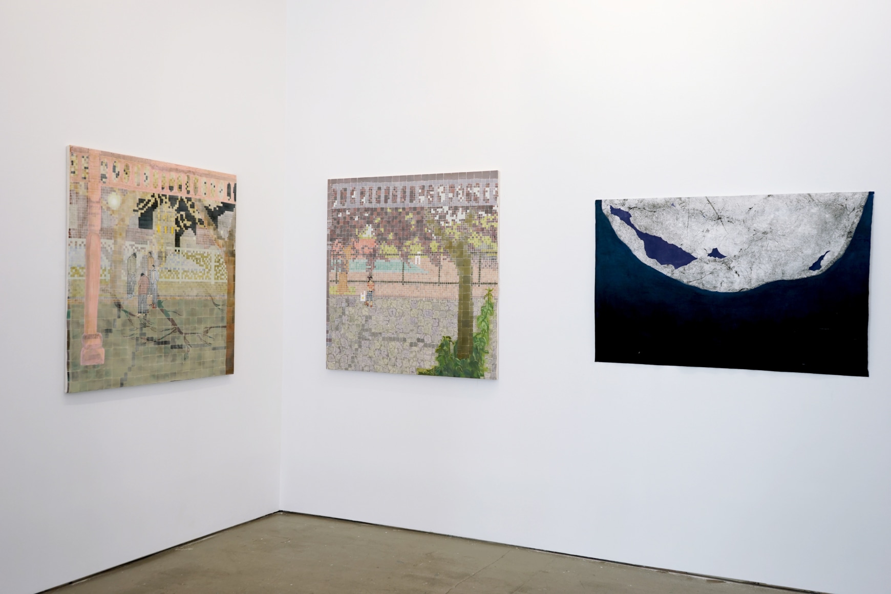 This is an installation view of the group exhibition Counter Narratives: Geographies of the Unfamiliar, which features paintings on the walls.