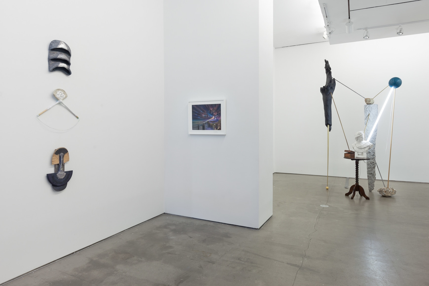 installation of sculptures, textiles, and paintings