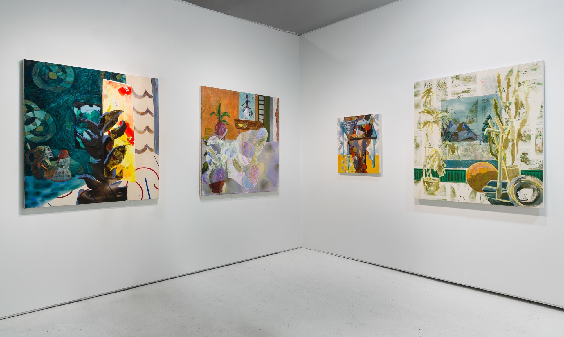 Installation of an open art fair booth, showcasing artwork on the walls.