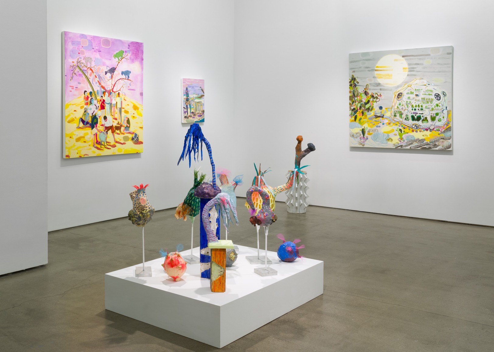 Installation view of Melanie Daniel's solo exhibition, featuring paintings and sculptures
