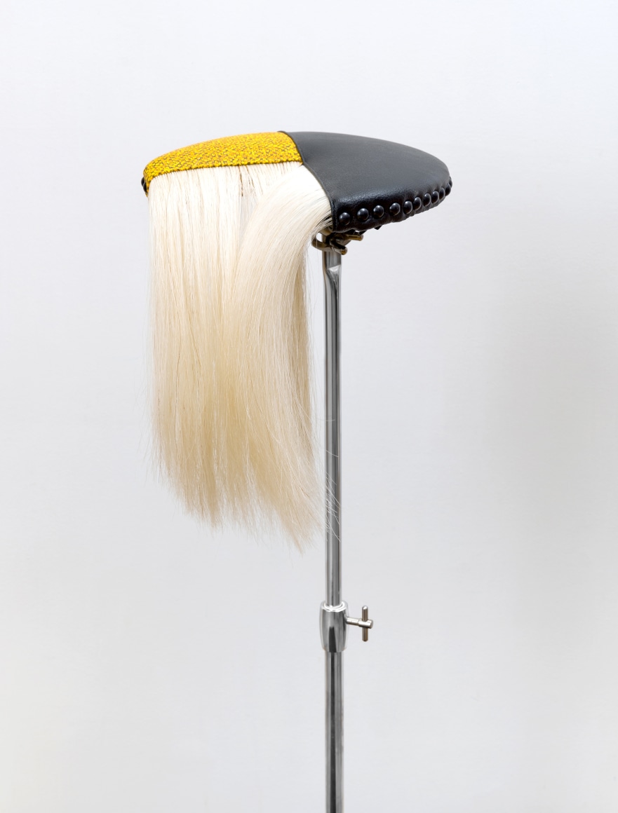 sculpture with hair and vinyl