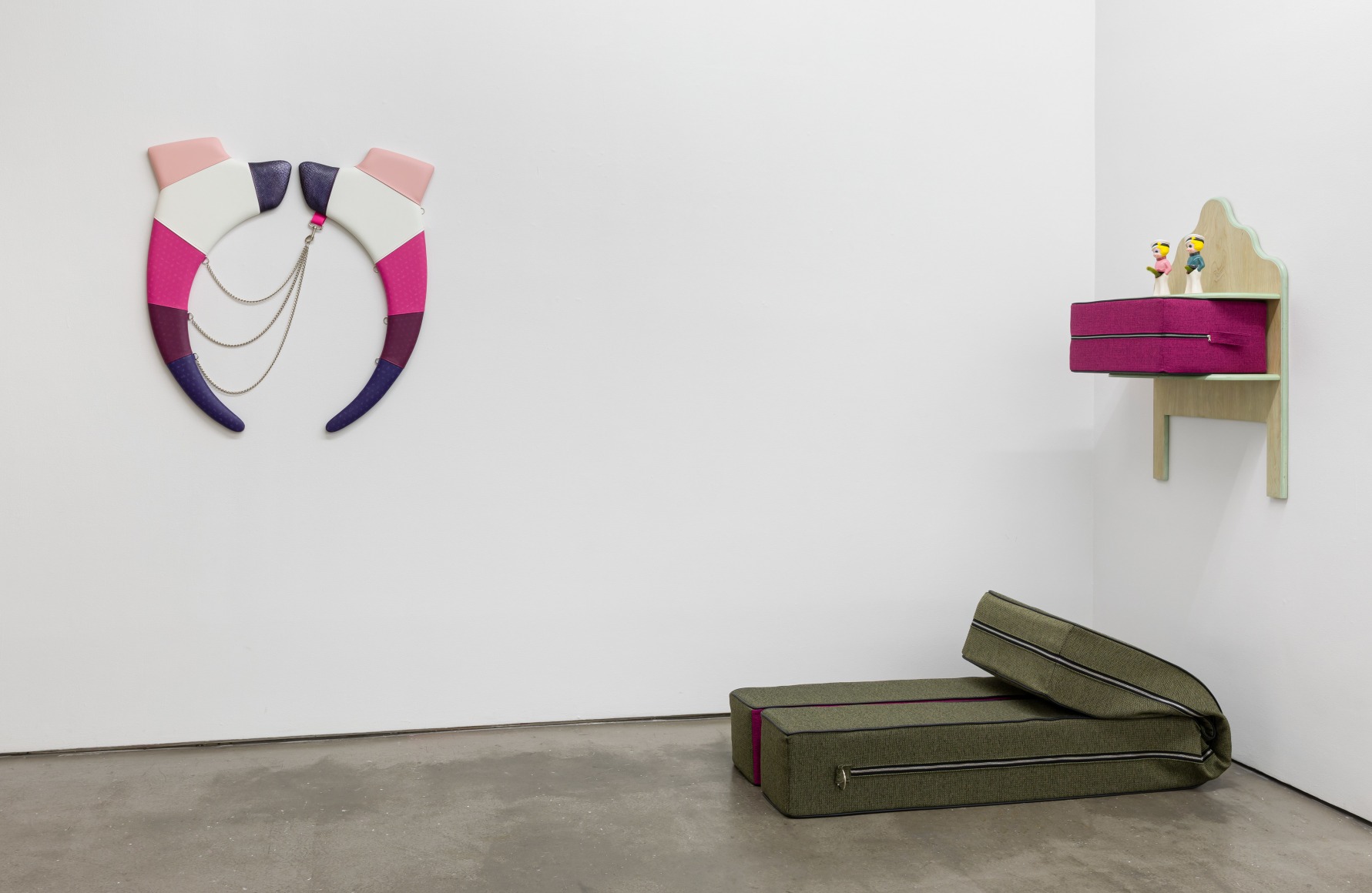 Corner Installation of vinyl floor and wall sculptures by Trish Tillman