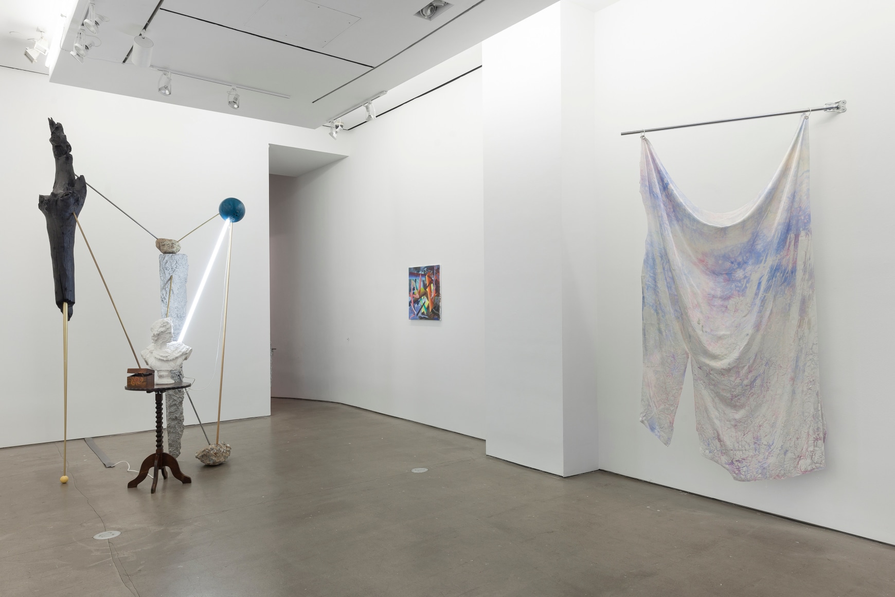 installation of sculptures, textiles, and paintings