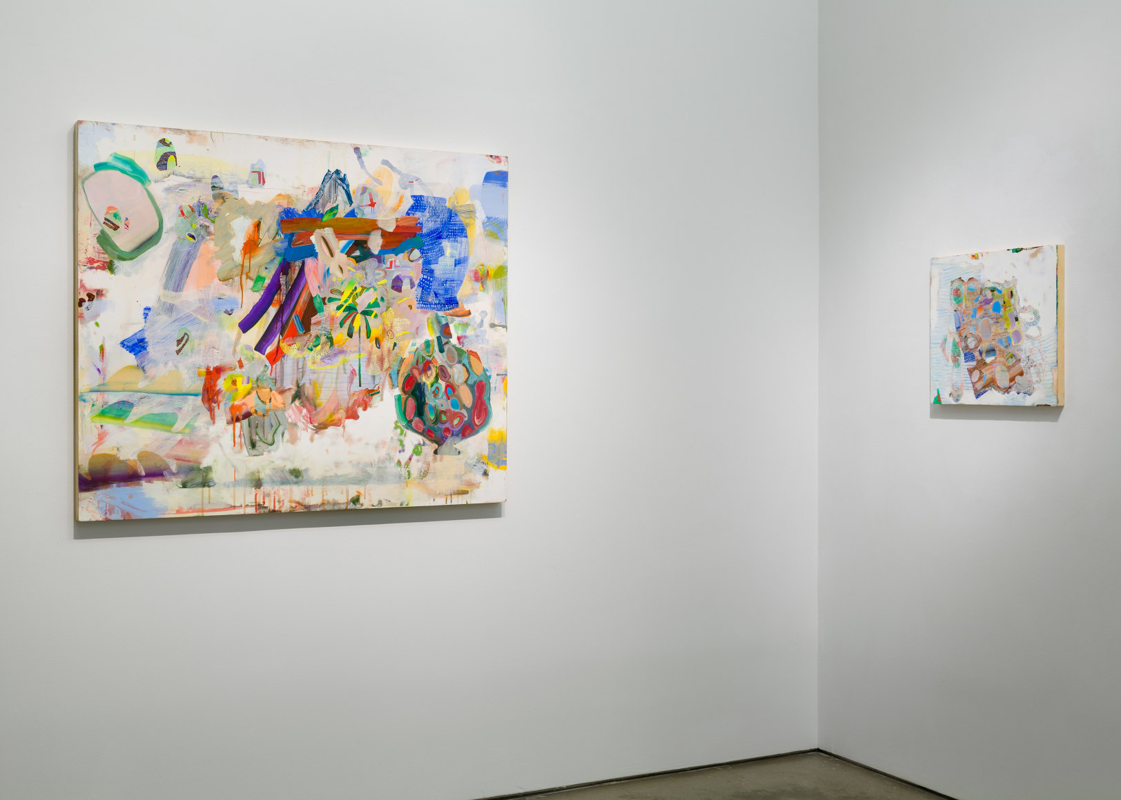 Installation image of Carolyn Case's solo exhibition. Two paintings line the gallery walls