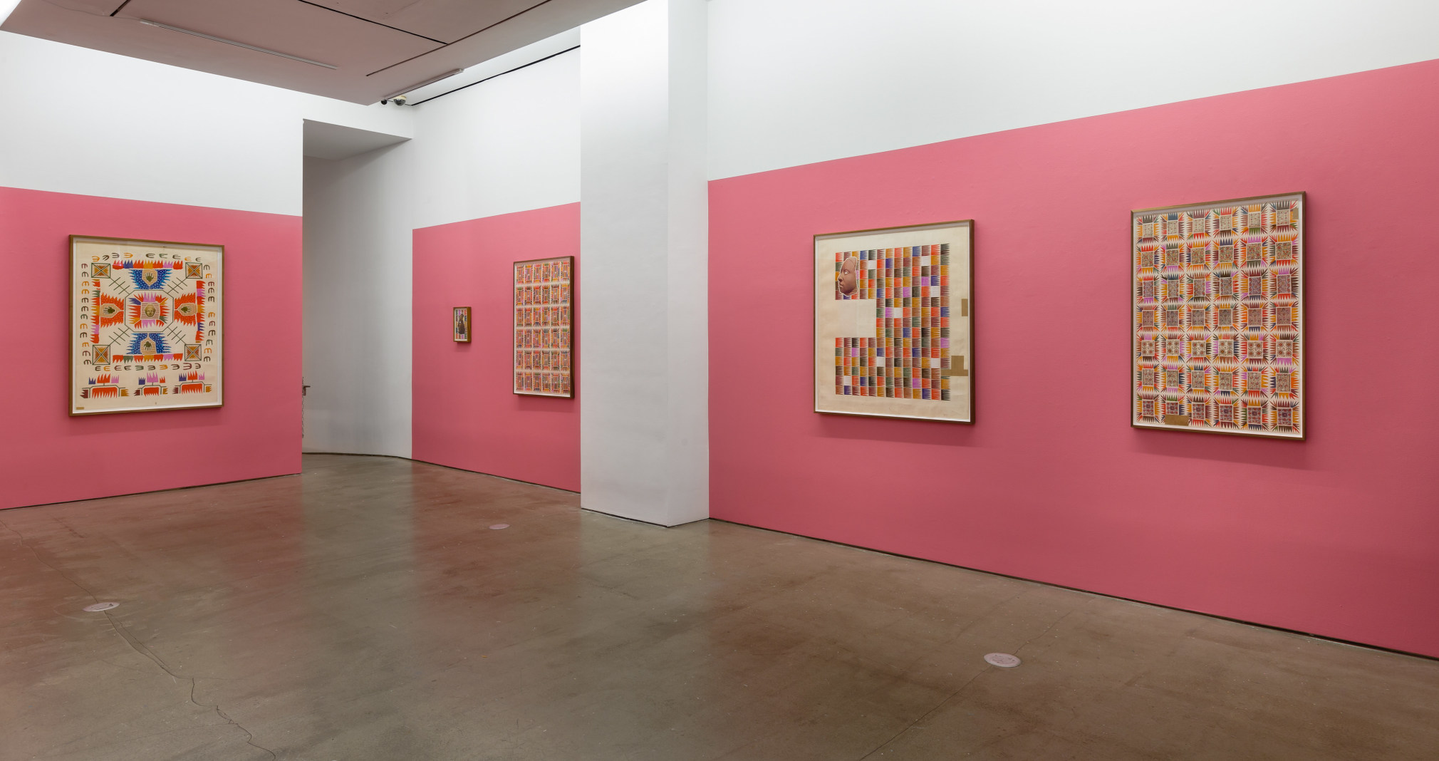 An installation view of Matthew Craven's solo exhibition, in which large and small framed collage pieces are hung on the gallery walls.