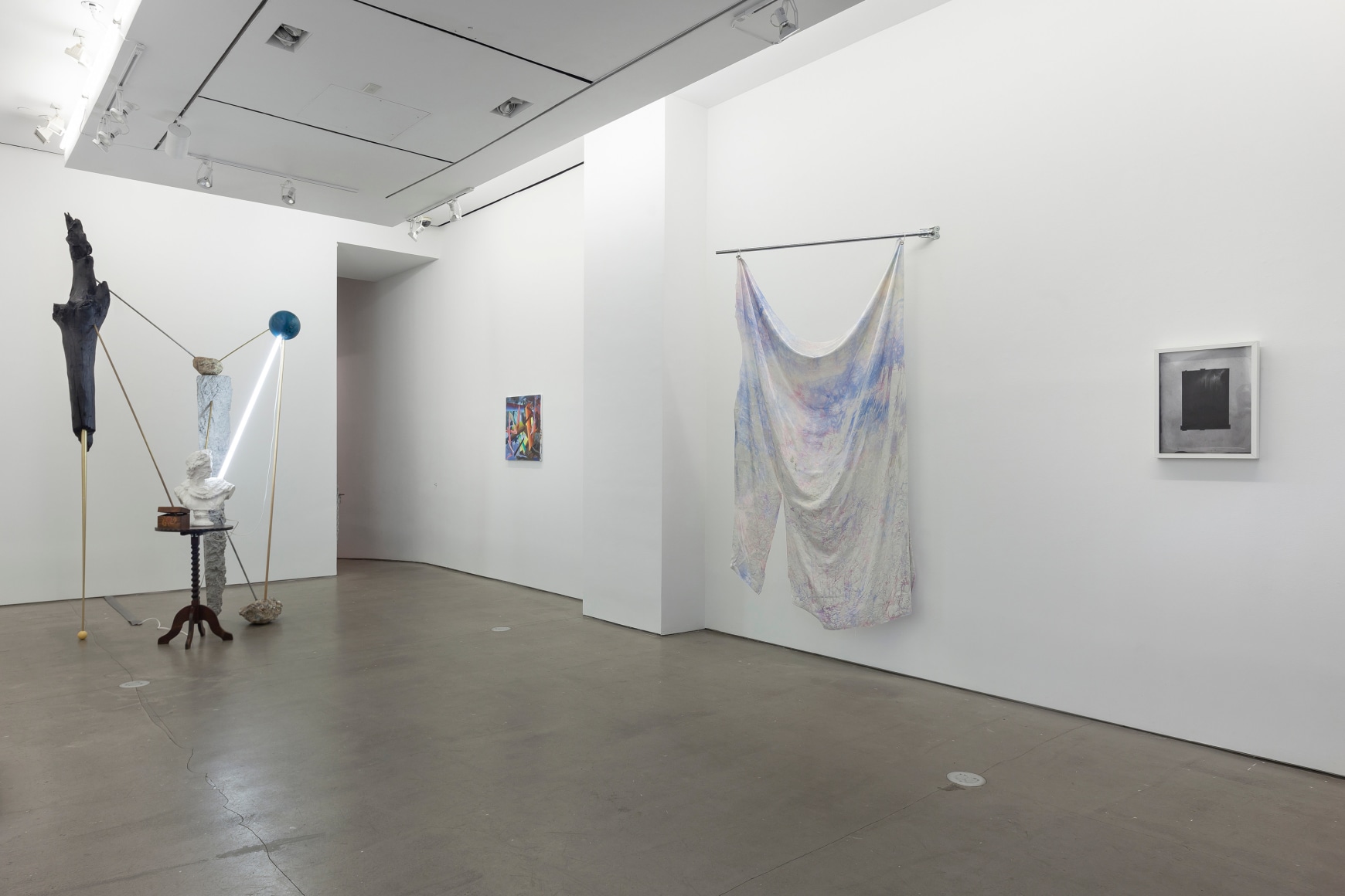 installation of sculptures, textiles, and paintings
