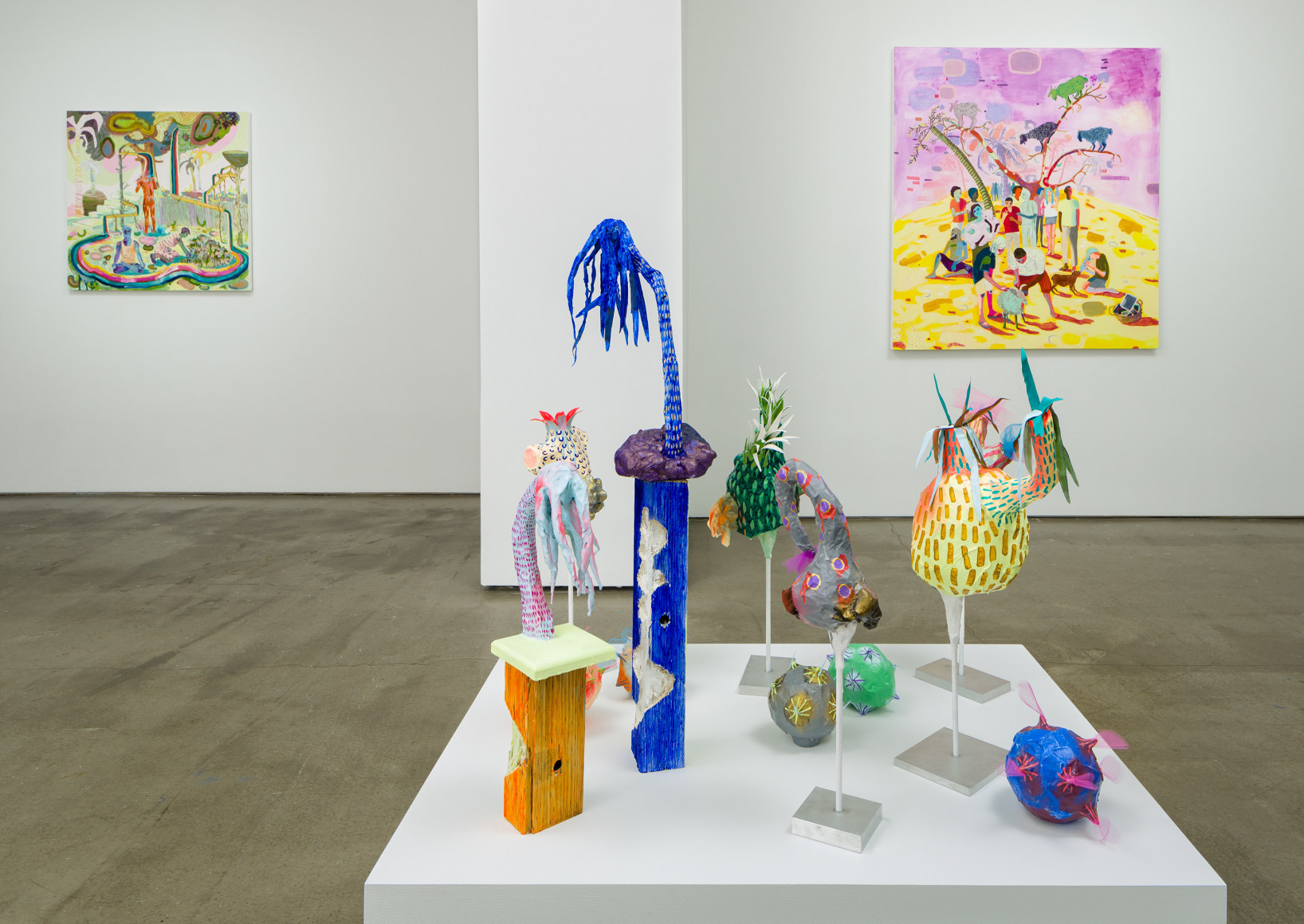 Installation view of Melanie Daniel's solo exhibition, featuring paintings and sculptures