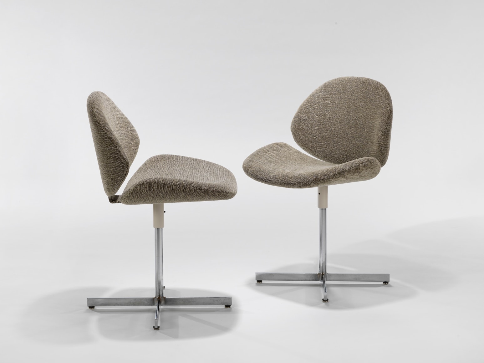 photograph of 2 chairs by Fermigier in a blank room