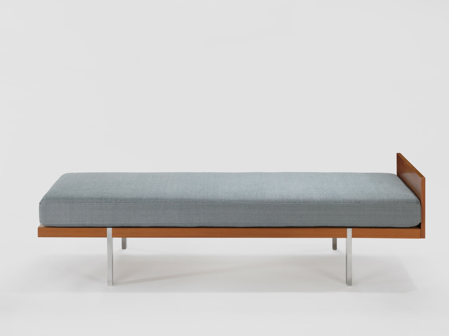 daybed in an empty room